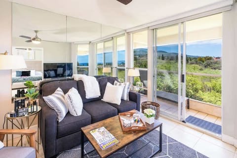 Relax in our bright, cozy living room with stunning views at 'The Maui Banyan' resort.