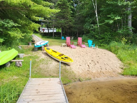 Your private sand beach with shallow walkin to lake.  