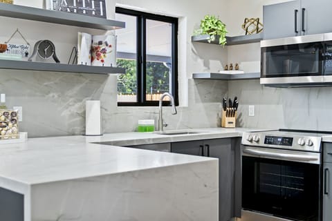 Cook up culinary wonders in this trendy kitchen oasis – truly amazing!