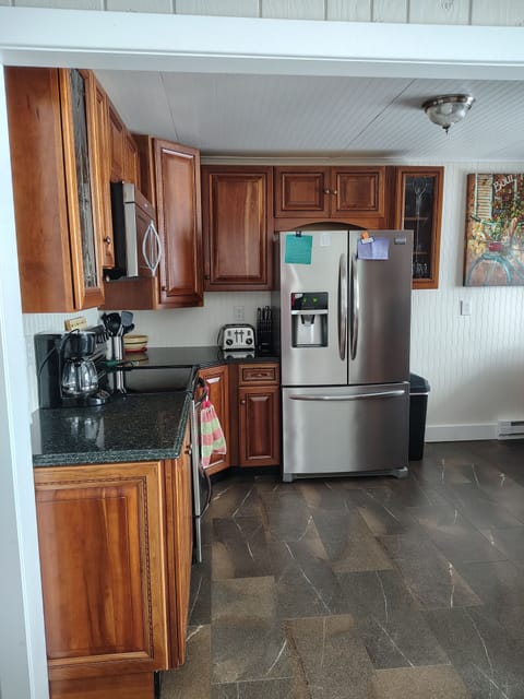 kitchen with drip coffee maker and toaster 