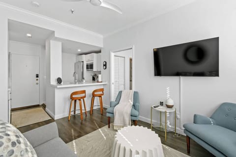 Living Area. Large, Fully stocked kitchenette. 2 seater bar counter
