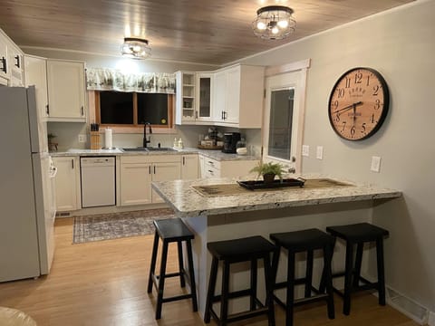 Extra bar stools located in garage. Folding tables available