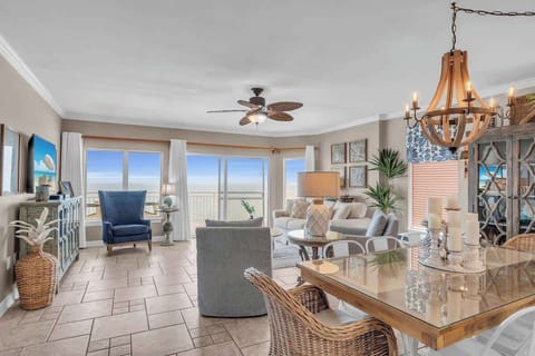 Floor-to-ceiling windows viewing the Gulf