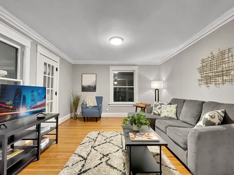 Gorgeous Living Room Area with screened in porch through the french door.