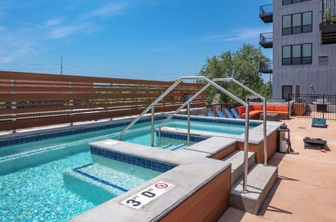 Shared hot tub that is ideal for relaxing after a long day, socializing with friends, or enjoying a quiet moment under the stars. 