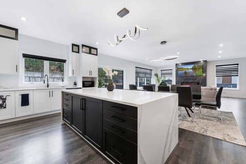 View from the kitchen showing seamless integration w/ living & dinning room area