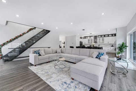 Elegant living room w/ modern decor ideal for relaxation & social gatherings