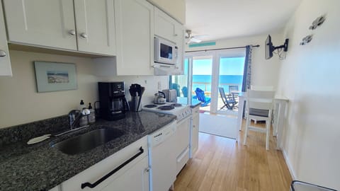 Looking from the kitchen towards the slider to the deckk