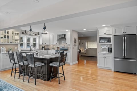 Large Kitchen with doors into common space