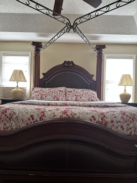 Bedroom #1 King Bed with Television, Dresser with Mirror and Walk-in Closet