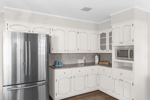 Spacious countertops with a large fridge