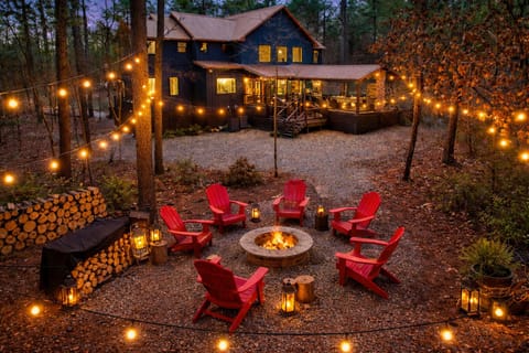 Cozy firepit nights under the string lights — guest favorite!