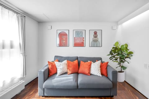 Pull-out sleeper couch, double bed size. 50 inch Smart TV in the living room.