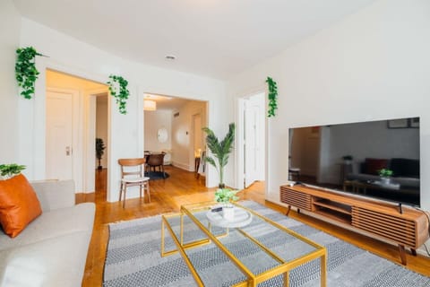 Unwind on the comfy couch and watch your favorite shows on the smart TV