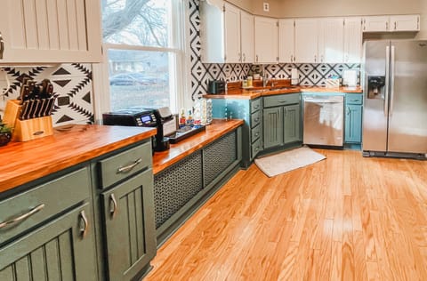 Our kitchen is well stocked including including an air fryer and toaster.