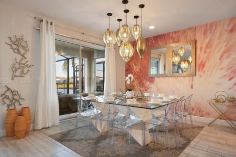 Elegant dining space with chic decor and serene lake views.