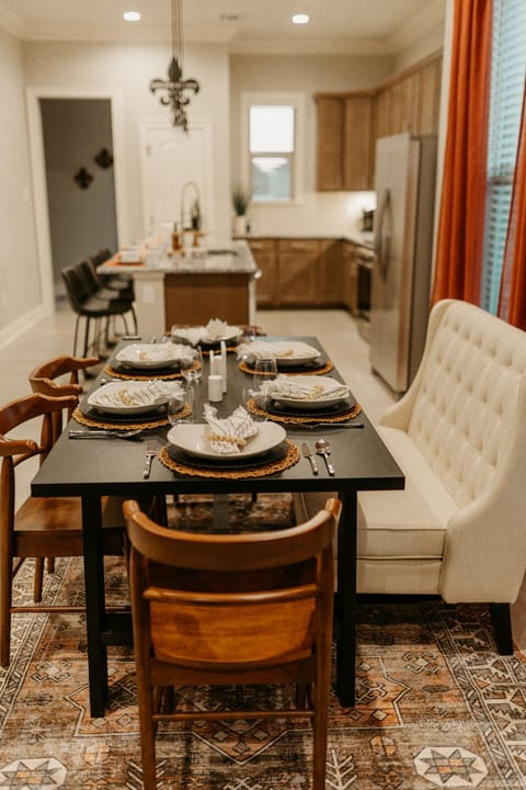 The dining room allows a more formal setting for up to 6 guests. 