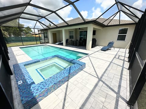Saltwater heated pool with hot tub