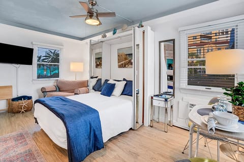Studio unit with 1 double size bed and a convertible twin sized lounge chair sleeper.