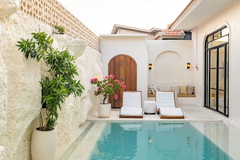 Relax in the sunbeds from the poolside