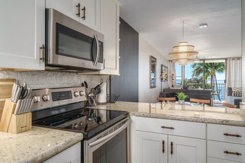 Our sleek and well-stocked kitchen makes cooking a breeze, with a hint of the beautiful ocean just beyond. 