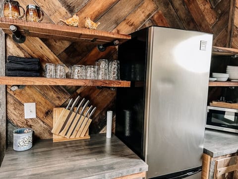 Rustic charm meets modern function. Fully stocked and guest-ready-- just bring the groceries!