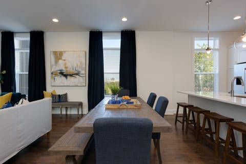 The large solid wood dining table is perfect for parties.