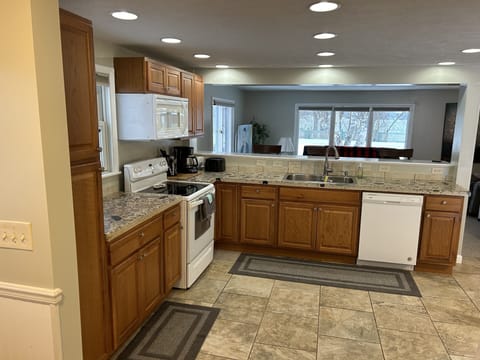 View of kitchenafter coming in from the garage.