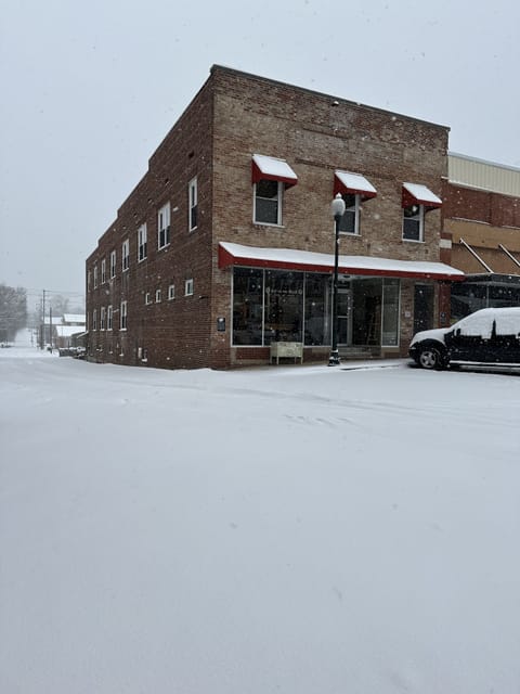 Our building in the snow storm of 2024. 