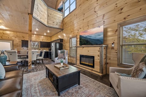 The fireplace is electric and has multiple heat settings