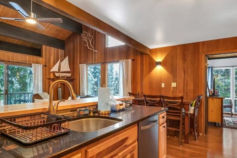 A dining table with seating for 6 is tucked just off the kitchen.