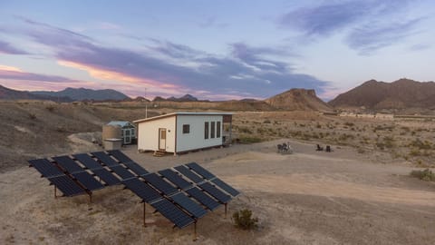 Fully off grid cabin utilizing the sustainable power of the Chihuahuan Desert.