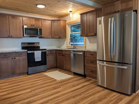 Full kitchen including a dish washer.