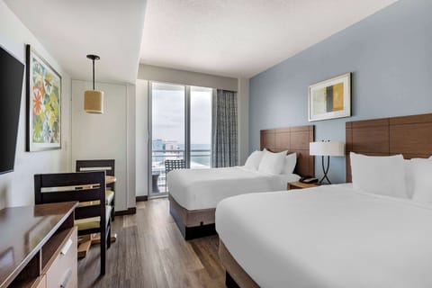 Wake up to coastal light and step onto the balcony.