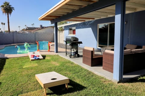 Backyard seating with fire table, grill and games