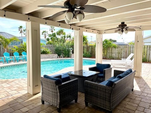 Covered outdoor patio with firepit table