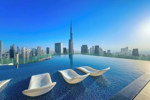 Rooftop swimming pool overlooking burj khalifa