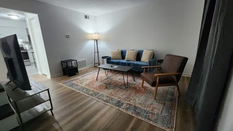 Living Room: Lounge in our living area, a space designed for you to relax and equipped with everything you need for a cozy evening in.