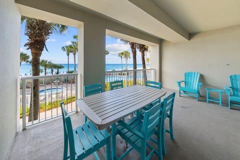 Your private balcony overlooking pristine beach and swaying palms offers the perfect spot for morning coffee or sunset dining.