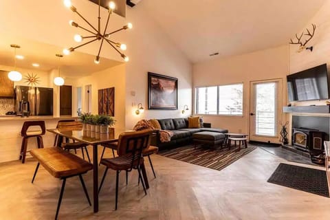 Living area - deck, fireplace, vaulted ceilings