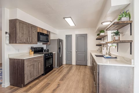 Modern appliances meet homey charm.