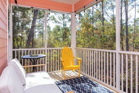 Screened Porch - A spacious, yet cozy screened porch offering seating, is the perfect area for enjoying outdoors without having to battle the elements.