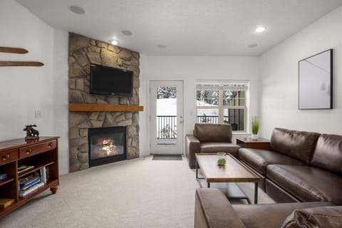 Living Room with Gas Fireplace and TV