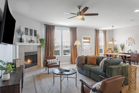 Living room fully furnished with open concept and fireplace!