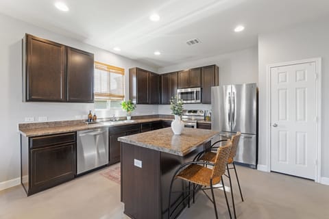 Fully equipped kitchen with stainless steel appliances