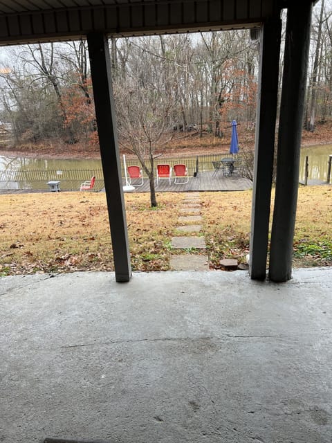 Covered porch, deck, and two swings by firepit(wood not supplied)