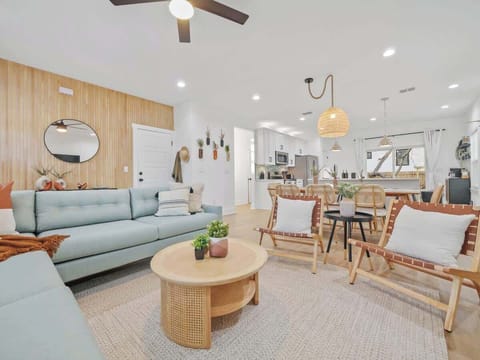 Open concept living room, dining room, and kitchen