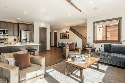 Designed for together time, the living room opens seamlessly to the dining area and kitchen—making it easy to relax, gather, and enjoy the space as a group.