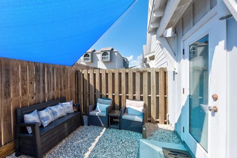 Relax in your private patio seating area with comfortable outdoor furniture and peaceful surroundings for morning coffee or evening unwinding.