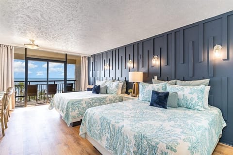 Two beds set up for easy rest after full days by the beach.
